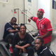 Trap Kitchen chefs Malachi “Spanky” Jenkins (seated, left) and Roberto “News” Smith (standing, right) with their manager, Nisa Ahmad, at the steps of their trailer at Paramount Studios in Los Angeles; delivery coordinator Kevin Burton is kneeling in front.
Courtesy of Nisa Ahmad
